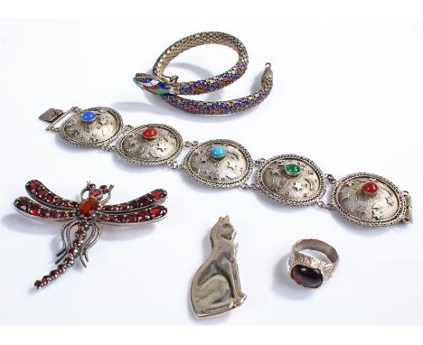 Silver jewellery, to include, a ring, two brooches, and two bracelets, (5)