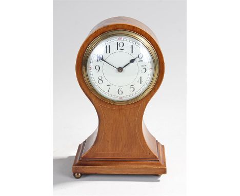 Early 20th Century balloon clock, the balloon case with white dial and black Arabic hours raised on bun feet, French movement