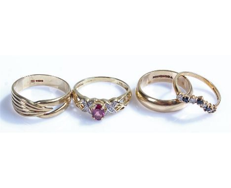 9 carat gold rings, to include a band, a sapphire ring, a cross over ring and stone set ring, (4)