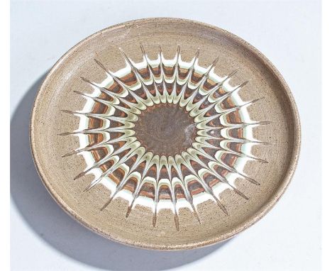 Poole pottery dish, with a multi colour burst design, 17cm wide