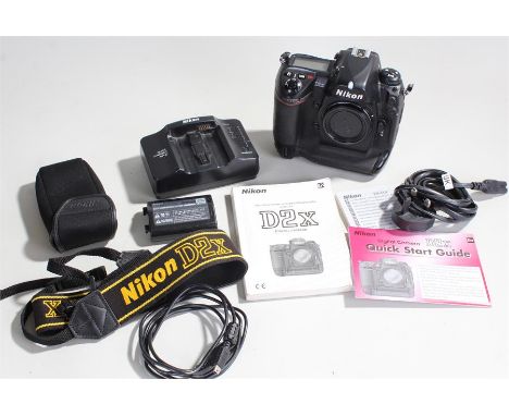 Nikon D2X digital camera, together with charger and manual 