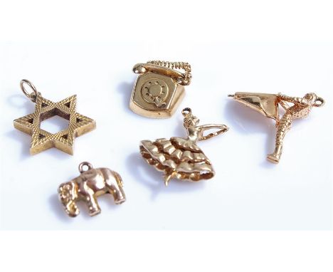 9 carat gold charms, to include a telephone, elephant, matador, dancer and star, 12 grams