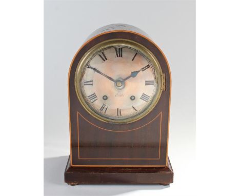 Early 20th Century mantel clock, retailed by Laing Glasgow, the arched case with a signed steel dial and Roman hours, twin tr