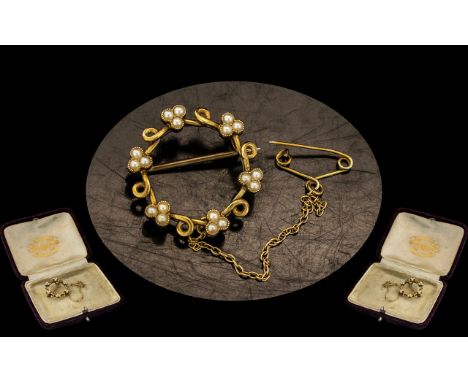 Antique Period - Exquisite 15ct Gold Seed Pearl Set Circular Brooch with Safety Chain and of Small Proportions. Marked 15ct. 