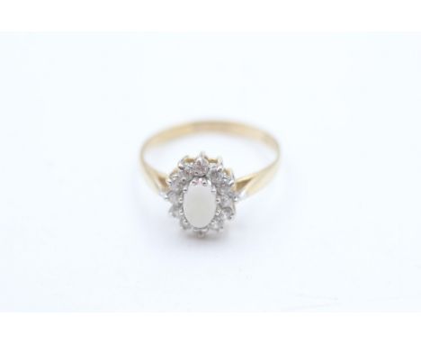 9ct gold opal and white gemstone halo ring (1.7g)