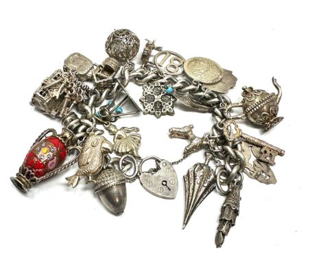 Vintage silver charm bracelet inc opening charms weight 96g