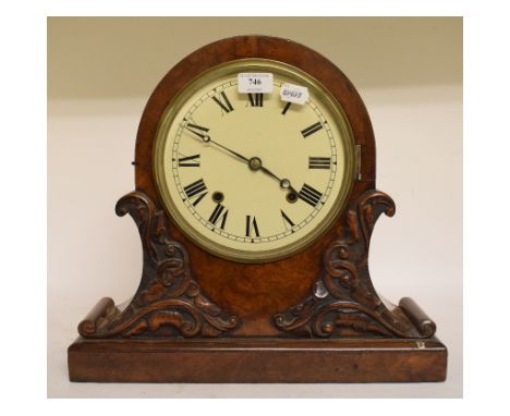 A large walnut mantel clock, with a 20 cm diameter white dial with Roman numerals, 39.5 cm high   Condition report  Report by