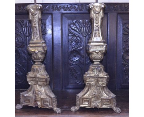 A pair of gilt metal lamp stands, fittings missing, 78 cm high (2)