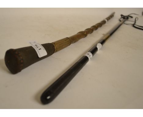 A folk art carved wood walking cane, decorated a coiled serpent with a leather handle, 80 cm long, and a whip (2)
