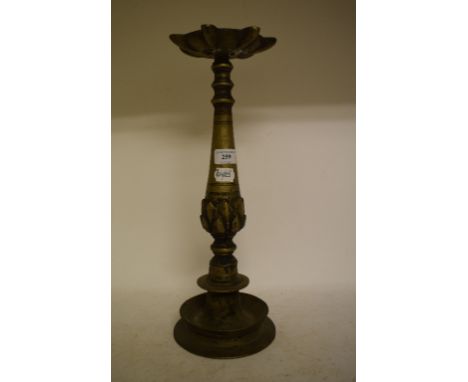 An Indian brass oil lamp stand, 43 cm high