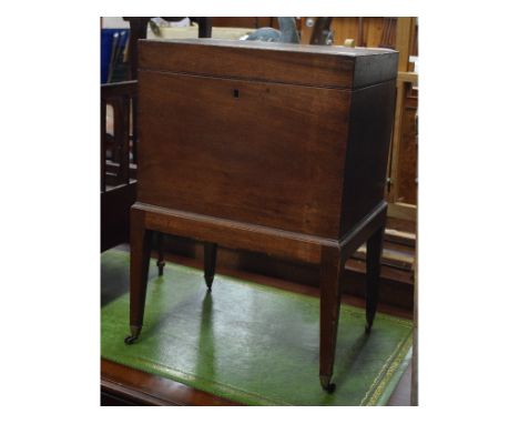 A mahogany wine cooler, 43 cm wide, a Canterbury, a circular tripod occasional table and a set of deer antlers (4)   Conditio