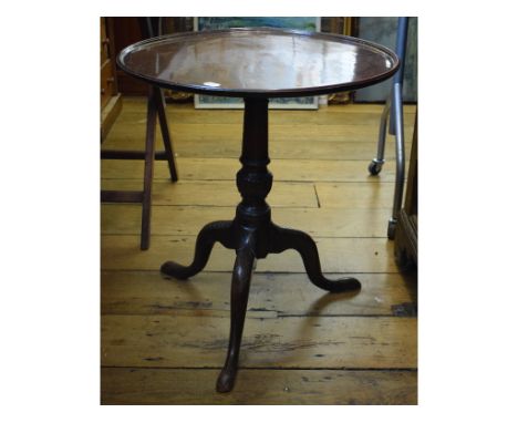 A 19th century mahogany tripod table, on leaf carved cabriole legs, 60 cm diameter