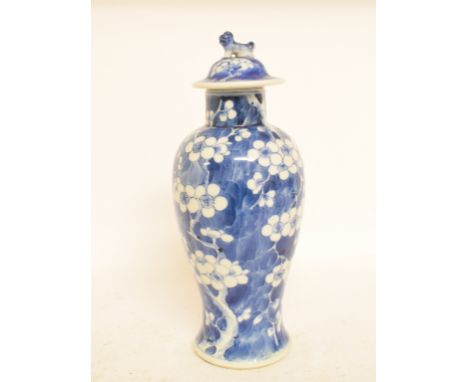 A Chinese blue and white prunus vase and associated cover, four character mark to base, 28 cm high   Condition report  Report