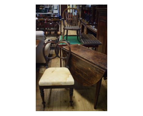 An oak drop leaf table, 98 cm wide, a child's oak and elm country stick back armchair, another chair, a card table, a mahogan