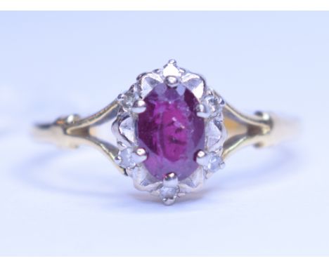An 18ct yellow gold and ruby ring, approx. ring size S½, and a silver handle walking cane, decorated horses (2)