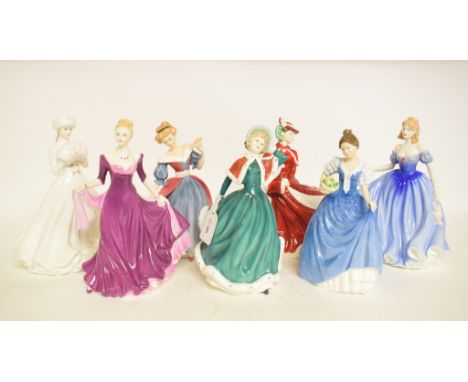 Seven Royal Doulton figures, including Christmas Day 2001, HN4315, a Royal Worcester figure, Anniversary Figurine Of The Year