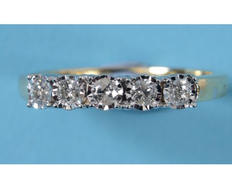 A 9ct gold and five stone diamond ring, approx. ring size L½  See inside front cover colour illustration   Condition report  
