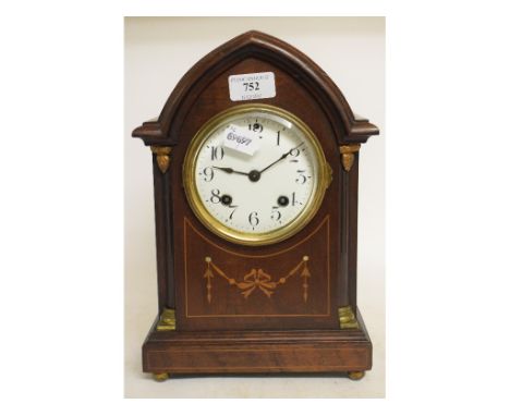 An inlaid mahogany mantel clock, 31 cm high