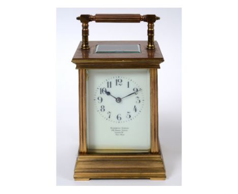 A carriage clock, the 7 cm wide dial with Arabic numerals, signed Goldsmiths Company, 112 Regent Street, London W, Paris Made