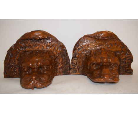 A carved wood wall bracket, in the form of a beast, 27 cm wide, and another (2)