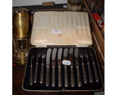 A set of six silver handled fruit eaters, cased, a E Thomas & Williams Ltd miners lamp, assorted die-cast vehicles, and other