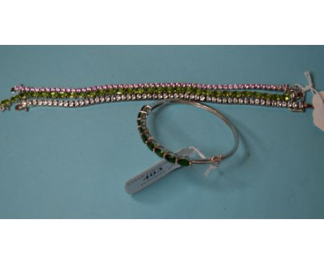 A silver line bracelet, and two others similar, and a silver bangle (4)