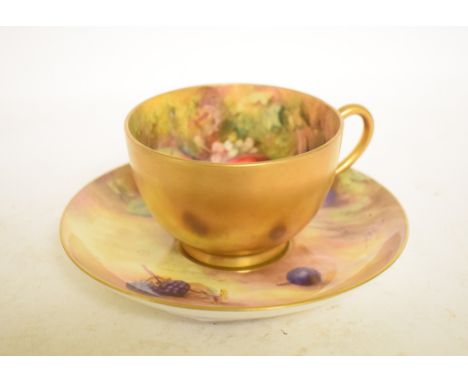 A Royal Worcester cup and saucer, painted fruit and berries, the cup signed WJ Bagnalls, the saucer signed HN Price, a Royal 