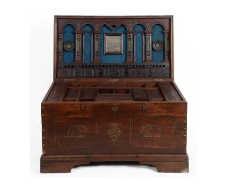 An Eastern hardwood trunk, having a fitted interior, 112 cm wide  See illustration