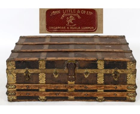 A wooden and metal bound trunk, with a label John Little, Singapore & Kuala Lumpur, 91 cm wide  See illustration   Condition 