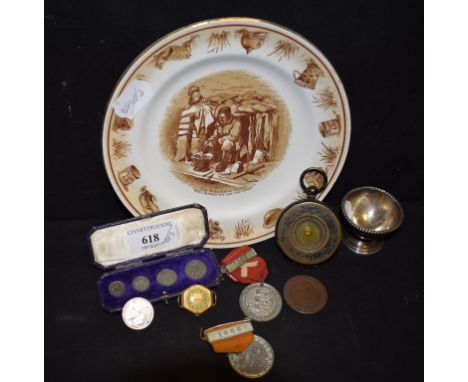 Assorted Maundy and other coins, a compass, a Bairnsfather Old Bill plate, and other items 