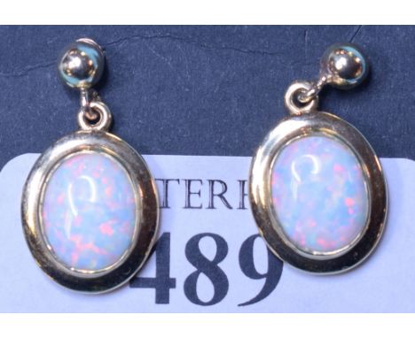 A pair of 9ct gold and Gilson opal drop earrings Condition report Modern