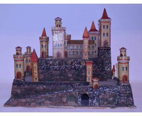 A Continental pine model of a fort, containing various battlements, towers and extensions, 51 cm wide