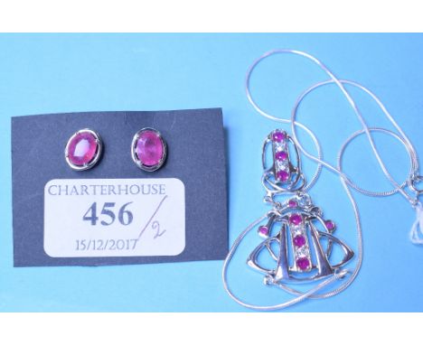 An Art Nouveau style silver and ruby necklace, and a pair of similar stud earrings (2)   Condition report  Report by NGModern