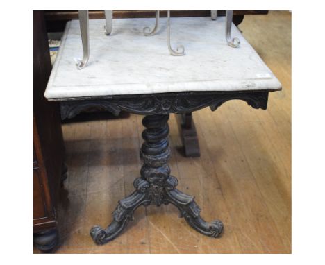 An ebonised marble top tripod occasional table, 62 cm wide