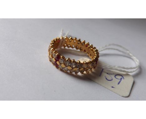 22ct gold eternity ring set with red &amp; white   stones approx size 'N' 5.6g inc (2 stones out)    