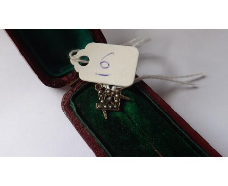 A Masonic gold and pearl stick pin (stones out)  in fitted box        