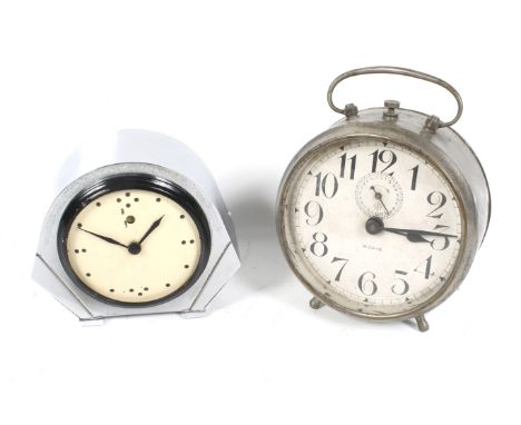 Two vintage clocks. Including an Art Deco Temco electric chrome mantel cloak and a traditional 8 days mechanical alarm clock.