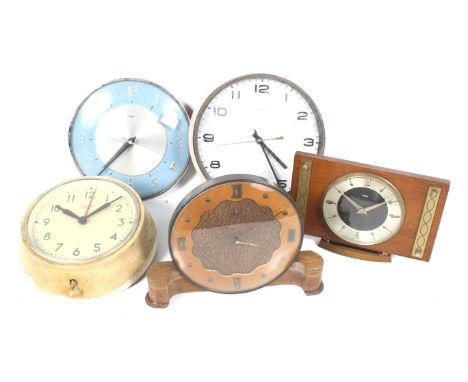 A collection of five assorted vintage English clocks. Including Smiths Sectric and Metamec. Consisting of two mantel and thre
