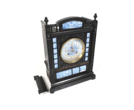 An Aesthetic enamel and ebonized wood cased mantel clock. An eight day CAF movement inscribed E. Flet no. 21434. Striking to 