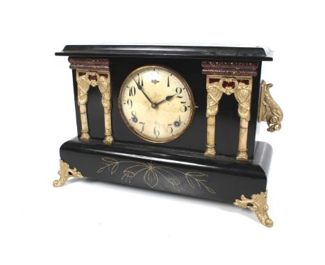 A early 20th century W L Gilbert Clock Co. USA striking mantel clock. Striking a bell on the half hour and a gong on the hour