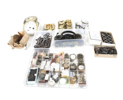 A collection of assorted vintage clock and watch parts/spares. Including dials, movements, case backs, etc.