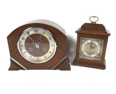 Two clocks. Including a F. W. Elliot bracket clock inscribed Kemp Bros. Bristol. Brass dial with silvered chapter ring with p