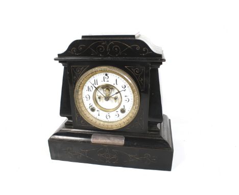 A 19th century eight day black cased metal mantel clock. With an Ansonia USA movement. Visible escapement, white enamel and g