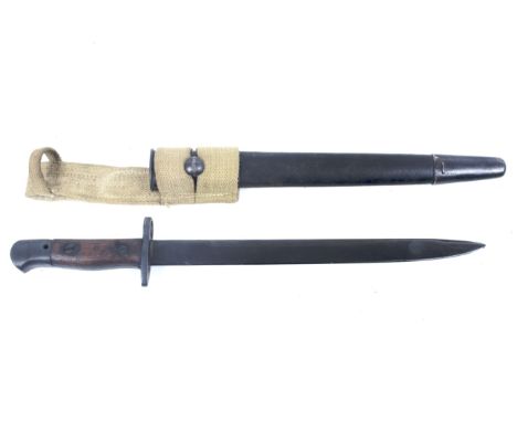 An India Pattern MKII SMLE bayonet. Blade length 30.1cm, the ricasso marked 'N.W.R'. and dated 42", with a wooden grip and a 