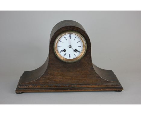 An early 20th century French mantel clock with Japy Freres movement striking on a bell, in dome shaped case on button feet