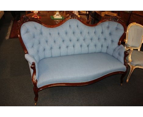 A fine late Victorian mahogany framed settee with wavy line back carved with shell and scroll decoration, blue button upholst