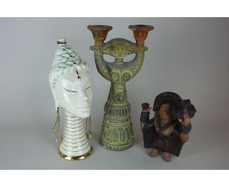 A mid 20th century Italian ceramic flask in the form of an Eastern woman, 29cm a pottery figure of an Aztec,  and a figure ch