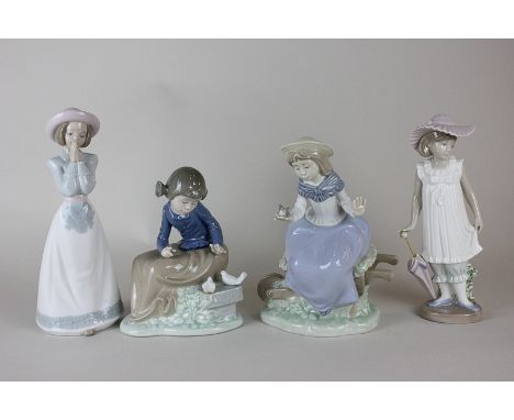 Four Nao porcelain figures of girls, one with umbrella and two with birds, tallest 21cm high