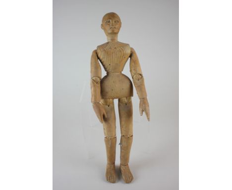 An artist's wooden mannequin figure, 35cm, (NC)
