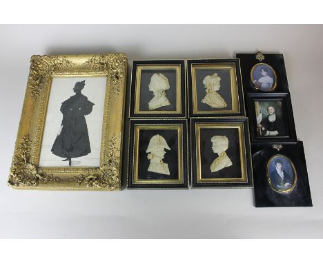 Attributed to Leslie Ray, a collection of four miniature wax portrait reliefs depicting a Naval officer, his wife and two chi